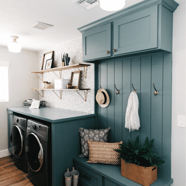 A washroom painted in studio blue green sw 0047 by @blissful_design_studio.