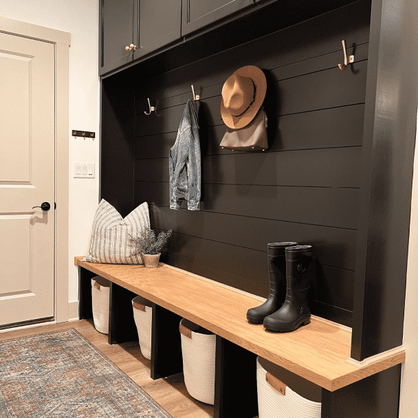 Entryway painted in Black Magic SW 6991 by @oliveandoakhome.