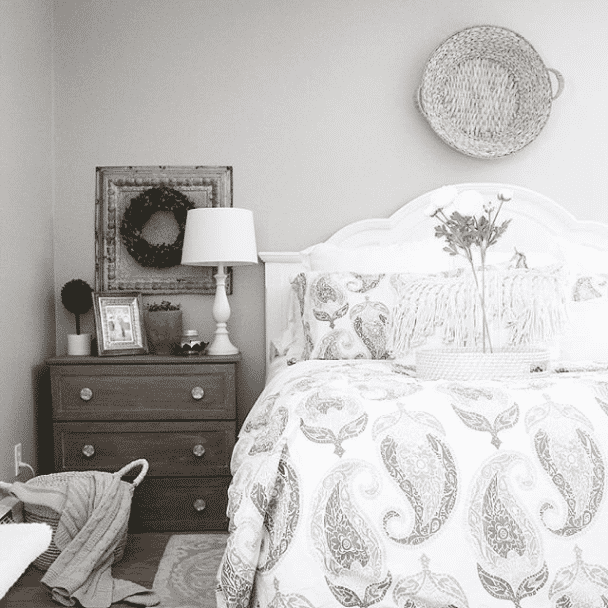A bedroom painted in mindful gray sw 7016 by @sarahwilliamshome.