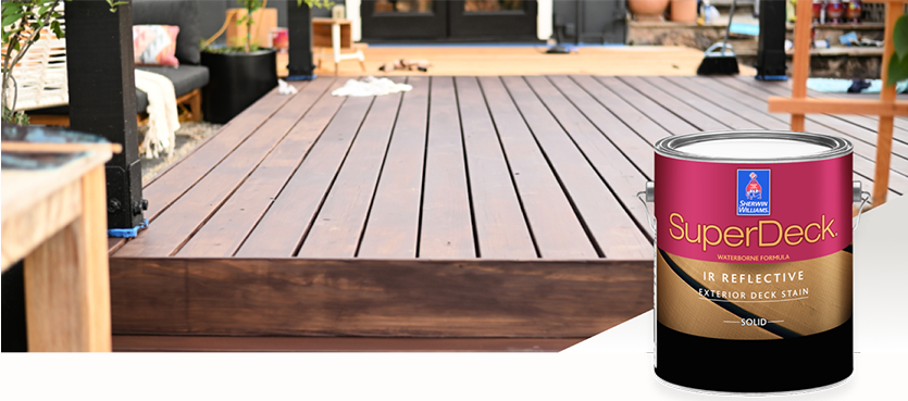 A large wood deck stained with Sherwin-Williams SuperDeck stain.