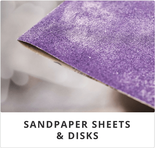 A folded piece of purple sandpaper from Sherwin-Williams Interior Paint Supplies.