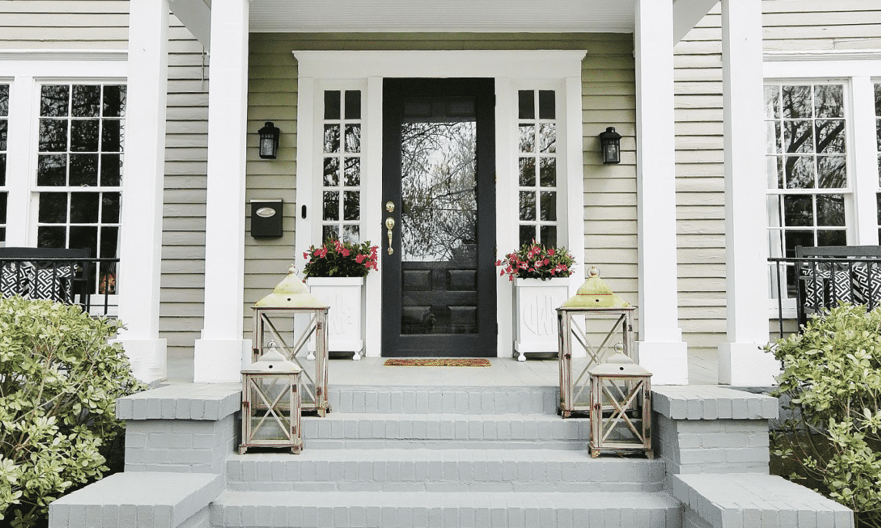 Front porch steps leading to door.