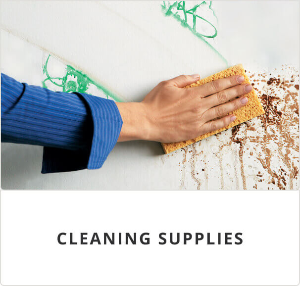 Cleaning supplies. A person wiping a spill with a soapy sponge.