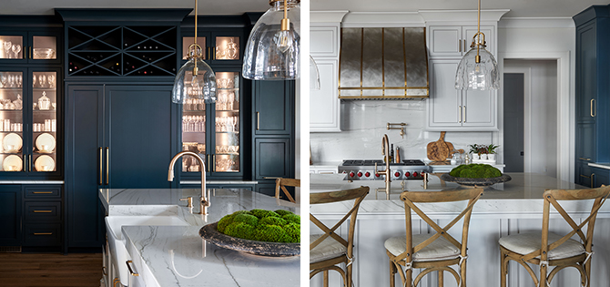 Modern kitchen with white and deep blue painted shaker cabinets, white marble countertops, lighted display shelving and farmhouse-style wood crossback chairs.