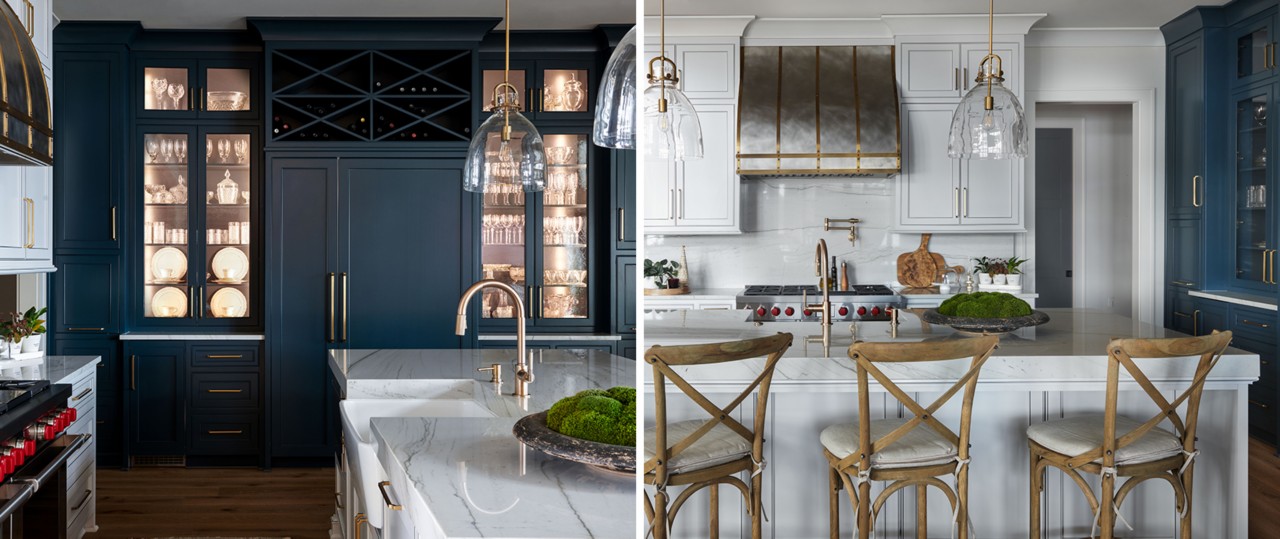 Modern kitchen with white and deep blue painted shaker cabinets, white marble countertops, lighted display shelving and farmhouse-style wood crossback chairs.