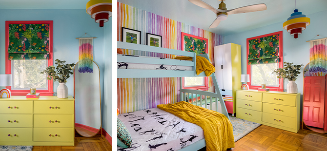 A colorful child’s room with light blue walls and bunk bed, yellow-green dresser and wardrobe, rainbow accent wall and details, and wood floor.