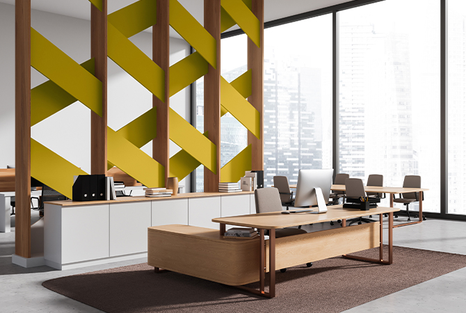 Office space with high ceilings, view over an urban cityscape, and an accent partition using Kingdom Gold.