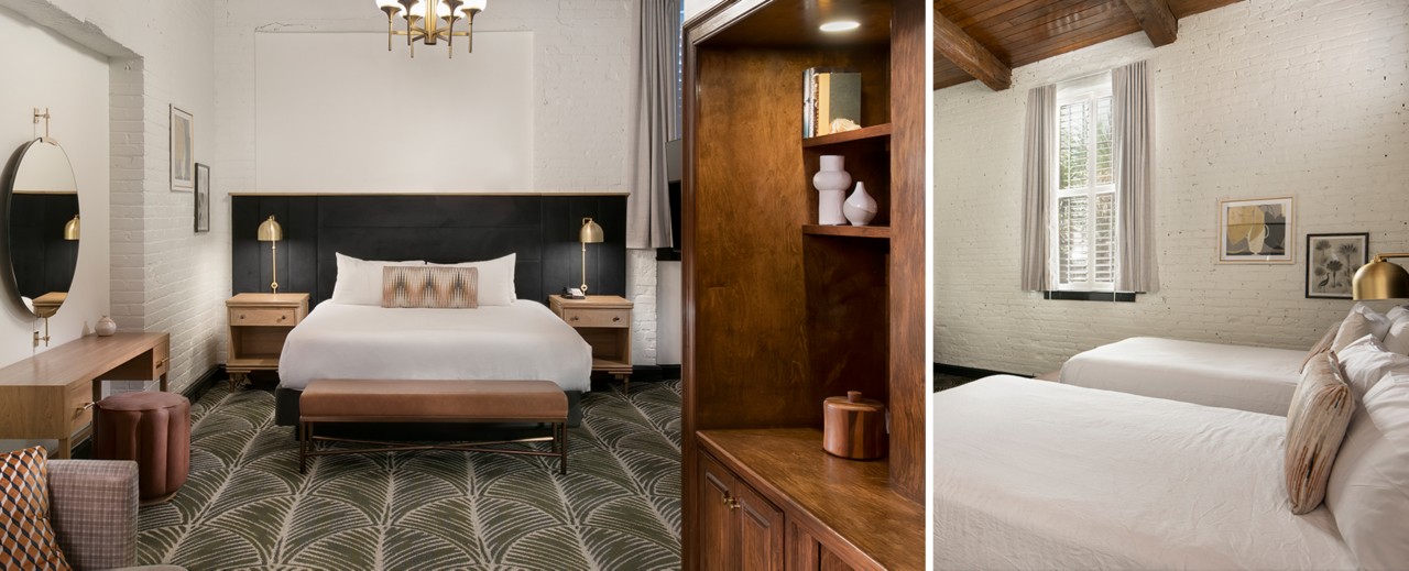 Hotel room with a large bed, elegant furnishings, and decorative elements with a two-toned focal wall painted Greek Villa and Greenblack.
