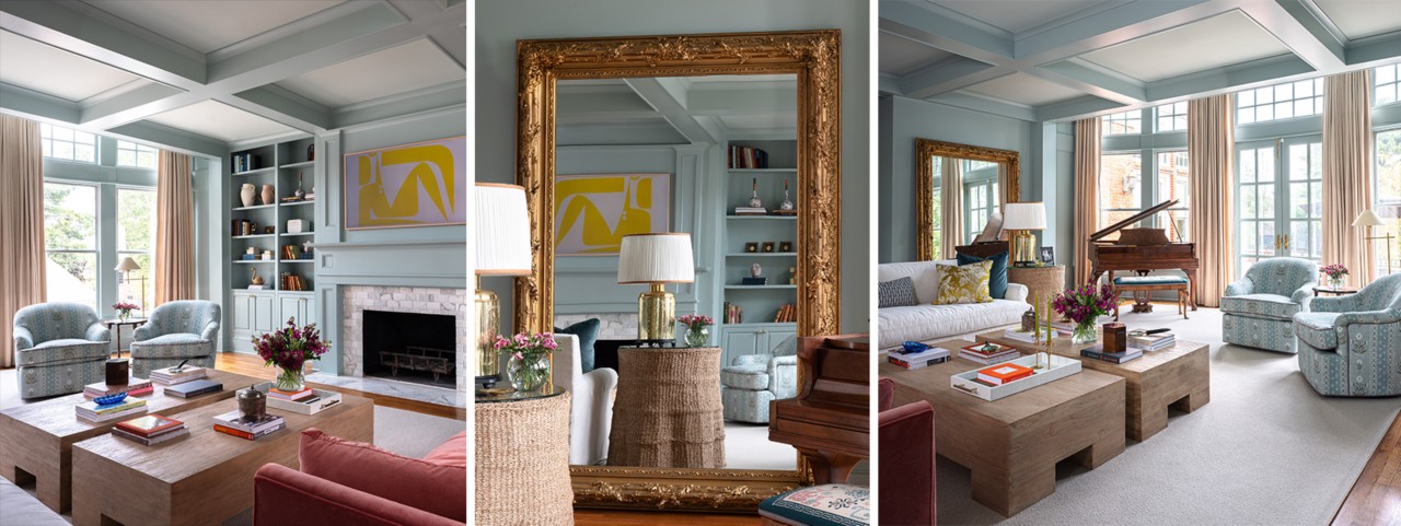 Light blue-green painted living room with matching round back arm chairs near tiled fireplace.