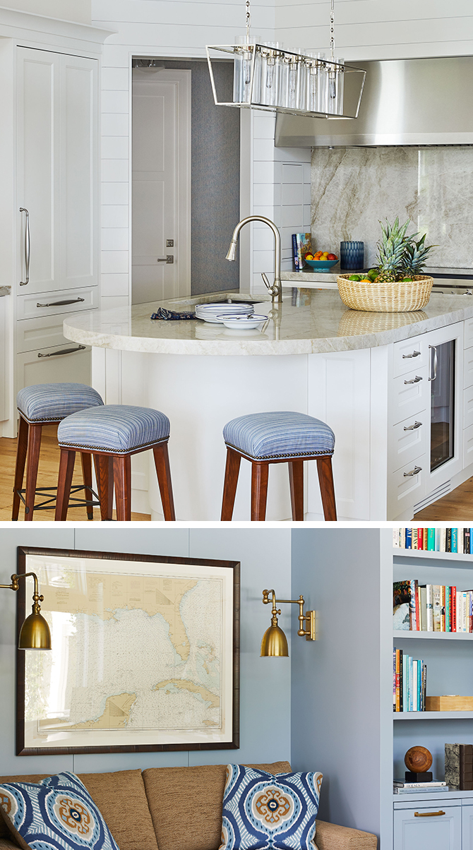 Modern kitchen and living room with marble counters, stools, a couch with patterned cushions, and a framed nautical map.