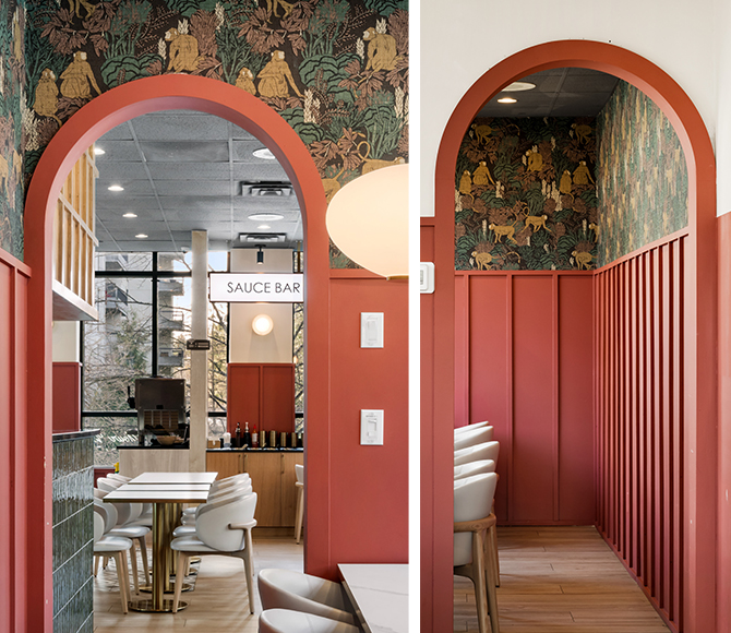 Interior with archways and molding painted in Sherwin-Williams Foxy, decorative wallpaper, white pendant light, and "SAUCE BAR" visible in the background.