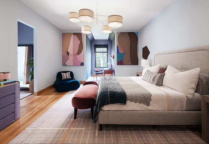 A modern bedroom with a large bed, abstract art of faces by Jose Lerma flanking a window, and a mix of contemporary furniture.