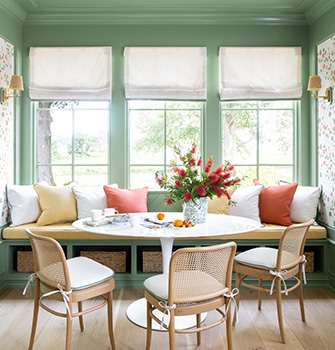 This divine dining room in the Southern Living 2021 Idea House showcases a lovely use of Leaflet SW 9674 from the Classic + Collected palette.