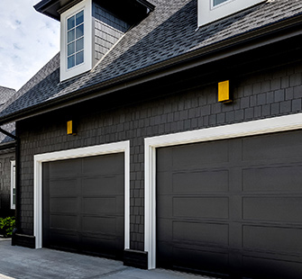 A modern garage painted with SW 7069 Iron Ore.