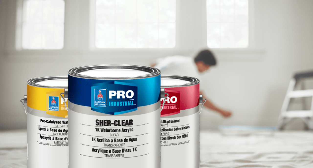 Three cans of Pro Industrial paint.