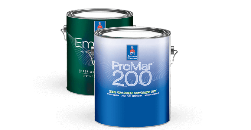 A can of ProMar 200 paint in front of a can of Emerald paint.