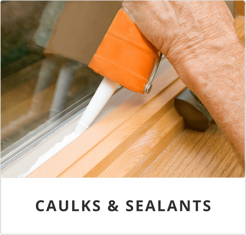 A person applying caulk or sealant to a surface.
