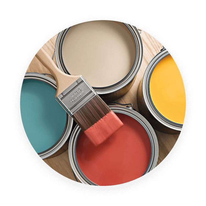 Four full, open paint cans with a brush laying across the top.