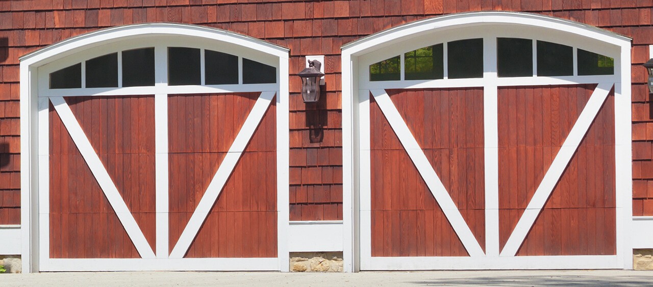 Two red and white garage doors.