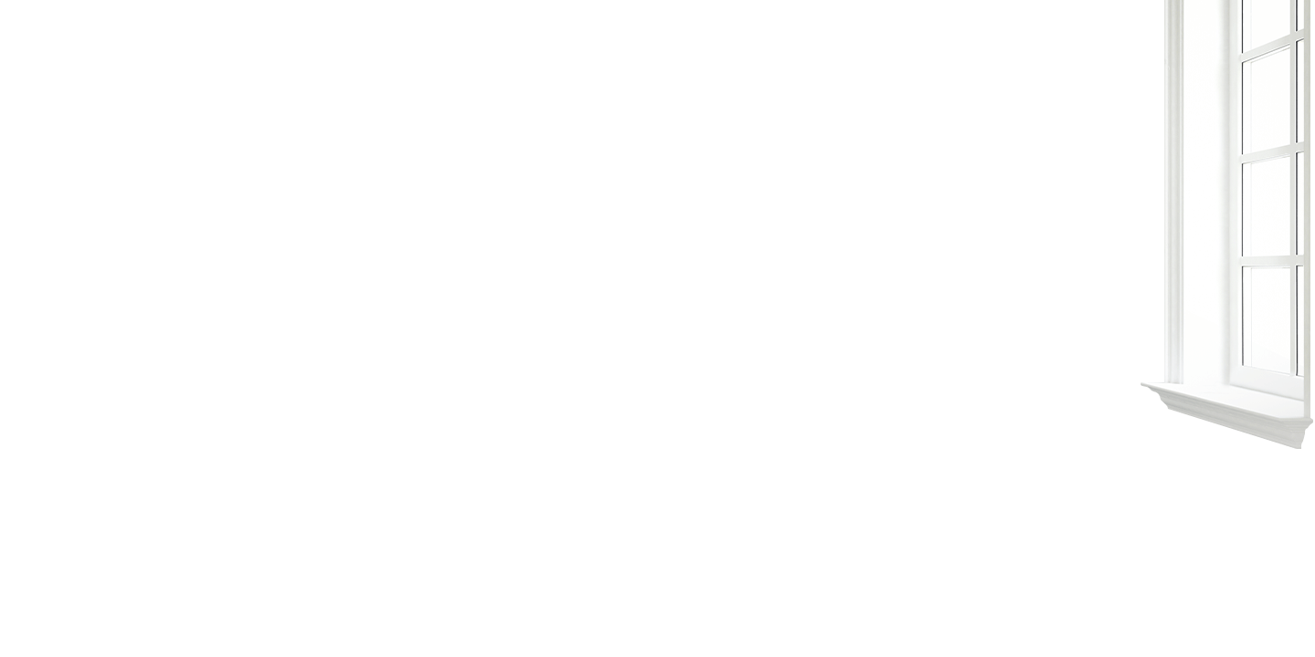 an open room with hardwood floors. To the left, there is an opening to another room, and to the right there is another wall with a window